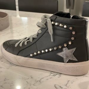 Brand new Shu Shop black star high tops! Size 7. Worn only in house one time!